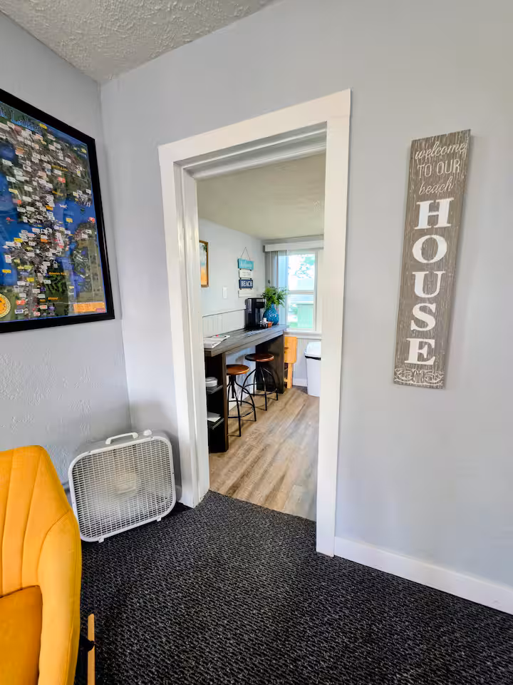 cottage bedroom corner and dining area